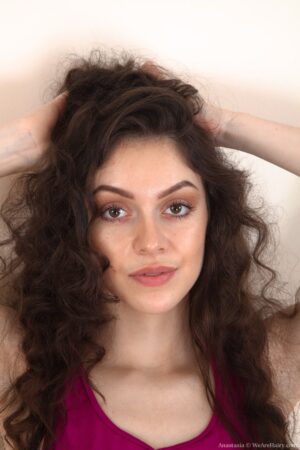 Thin bodied Anastasia takes down her panties and spreads her hairy ass