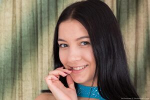 Brunette cutie Bellavitana strips off her dress and slips a finger in her hair pie - bellavitana-strips-off-her-sexy-blue-dress1