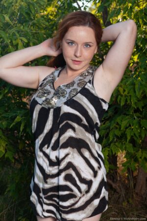 Pale skinned redhead Elouisa spreads her thick hirsute ass outdoors - elouisa-strips-nude-while-enjoying-her-picnic3
