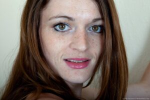 Hairy woman Louise Harmen removes black dress