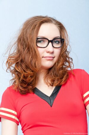 Teen cutie Sabrina looking hot in stockings with her legs open showing her hairy goodies