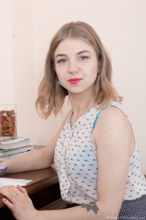 Kristinka strips naked while at the office